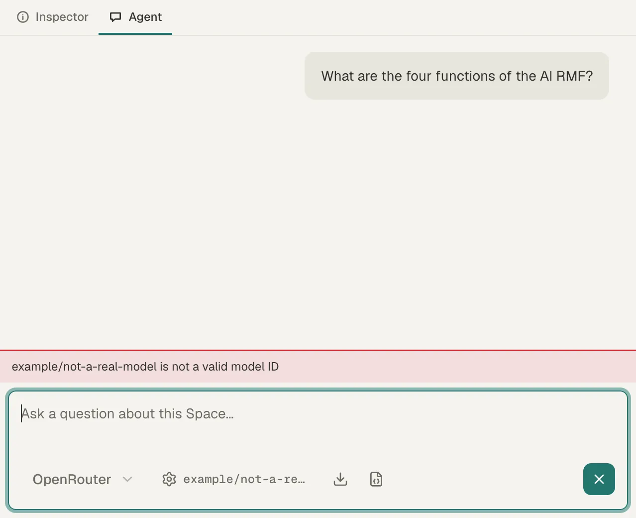The Agent tab with OpenRouter chosen and a red bar above the chat box that reads example/not-a-real-model is not a valid model ID